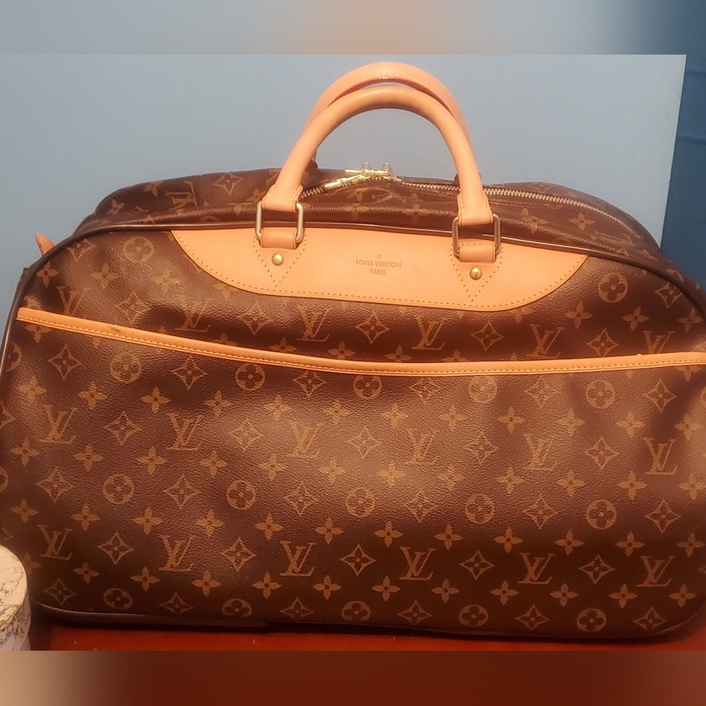 Authentic Louis Vuitton Monogram Rolling Duffel (Eole)